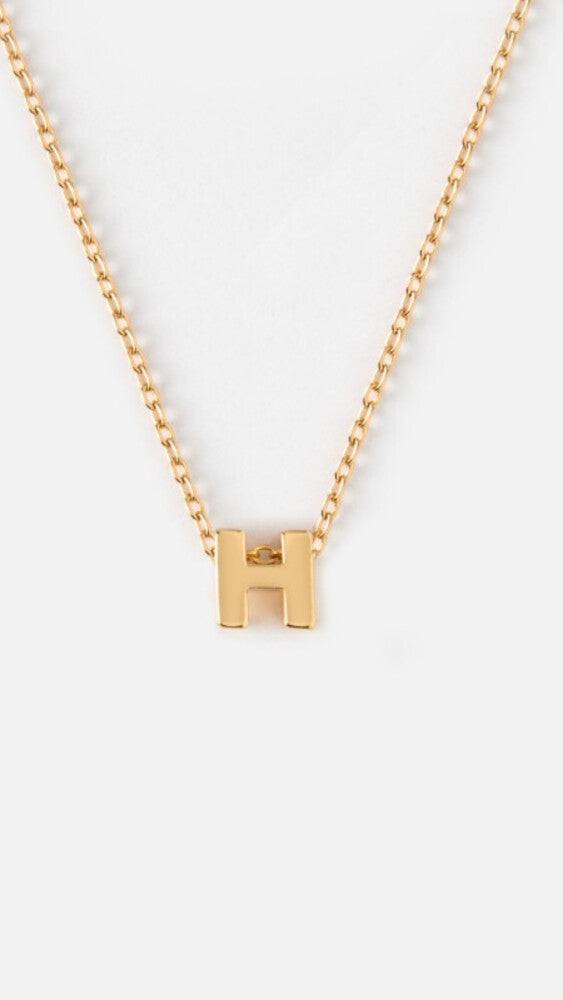 Initialsmykke H