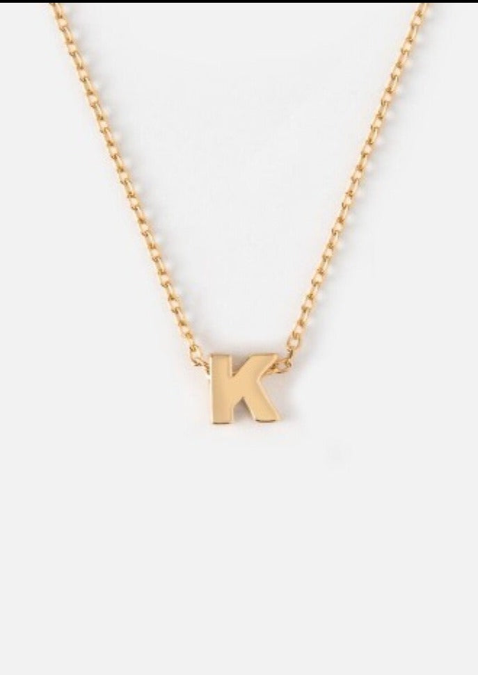Initialsmykke K