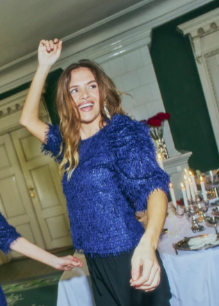 Blå topp med frynsestoff