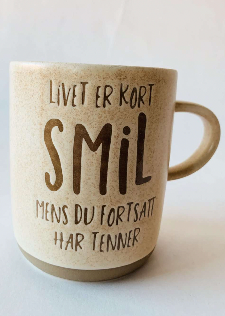 Krus smil mens du har tenner