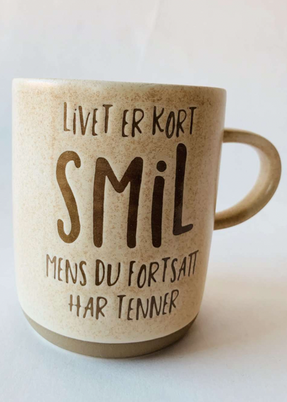 Krus smil mens du har tenner