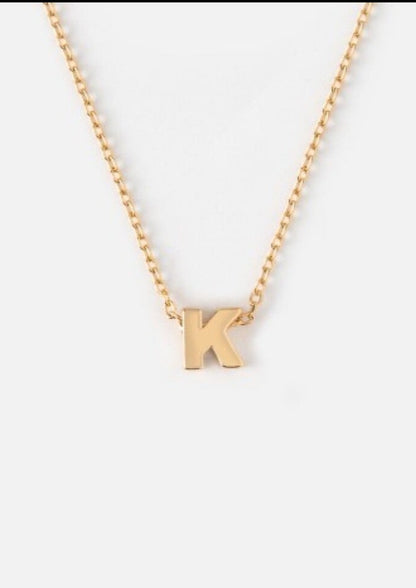 Initialsmykke K