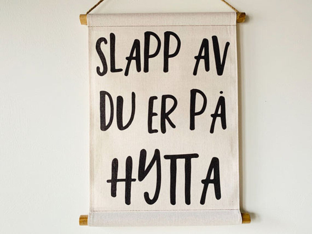 Plansje "Slapp av du er på hytta"