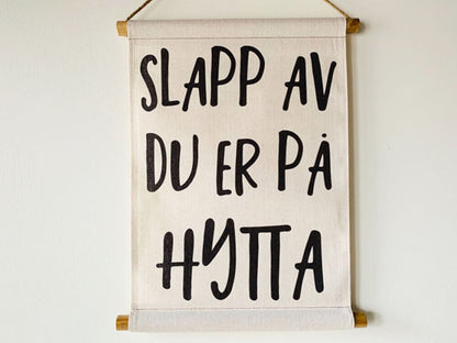 Plansje "Slapp av du er på hytta"