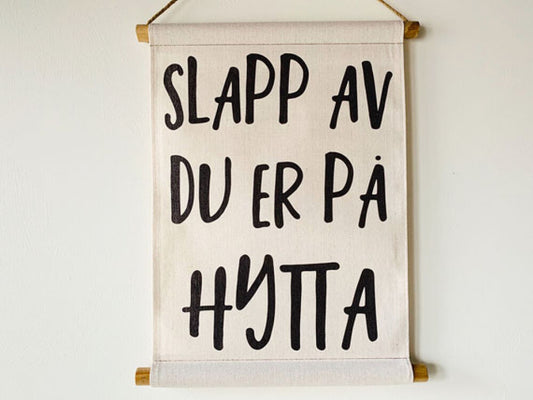 Plansje "Slapp av du er på hytta"